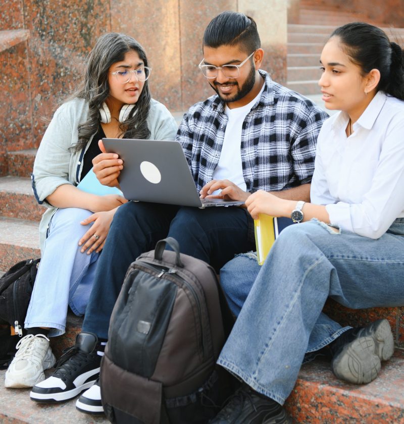 Group of Indian or Asian college students in the campus.